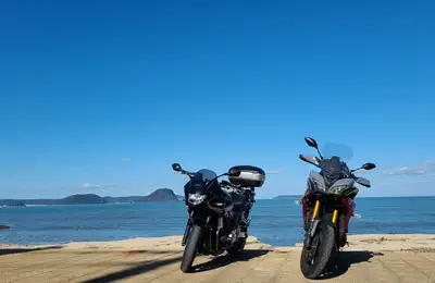 ~200 km — a ferry to Amakusa, Tomioka Castle, the Ushibuka Haiya Bridge, and a scenic entry to Kagoshima.