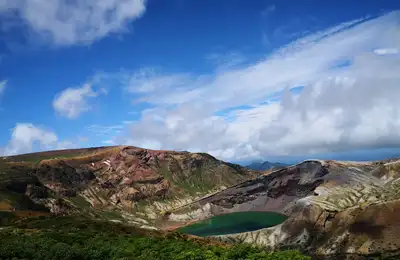 The steaming Nakadake Crater, the golden grasslands of Kusasenri, Aso Shrine and a shojin ryori kaiseki dinner in Kumamoto.