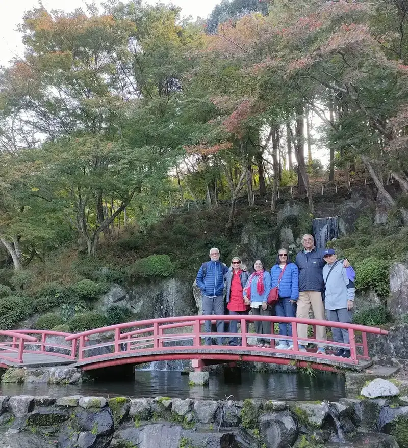 family photo bridge over water kyushu