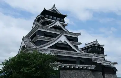 Suizenji Jojuen garden, Kumamoto Castle, and a train south to Kagoshima.