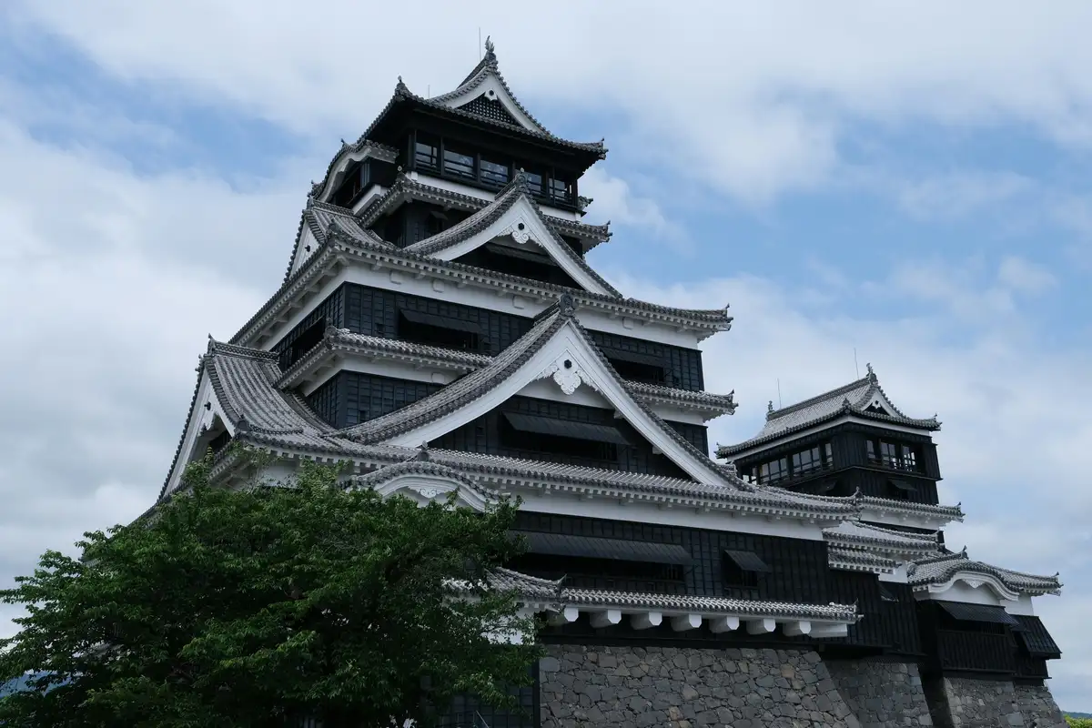 Suizenji Jojuen garden, Kumamoto Castle, and a train south to Kagoshima.