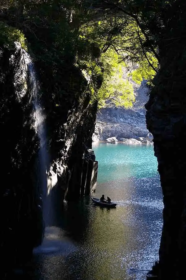 Takachiho Gorge, an active volcano crater, and the majestic Kumamoto Castle.