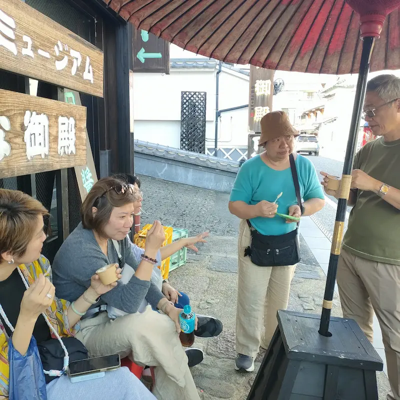 Travelers enjoying a snack and a rest